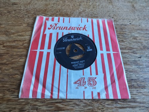 Buddy holly rock around with - rock,